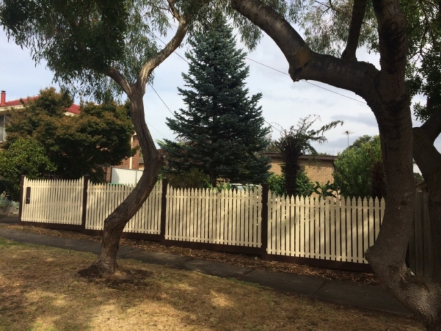 Cream steel picket fence with brown letterbox, posts and bottom rail - Geelong