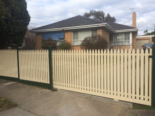 Steel picket fence and sliding gate