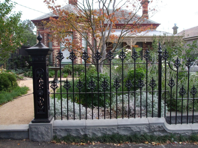Black wrought iron fence