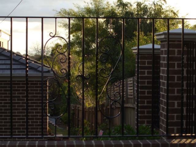 Black wrought iron infill panels