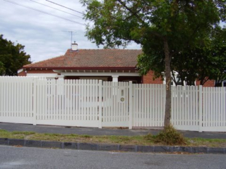 white steel picket fence