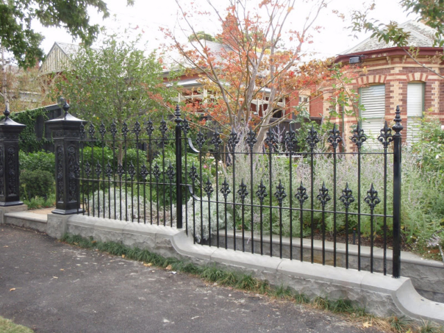 Black wrought iron fence
